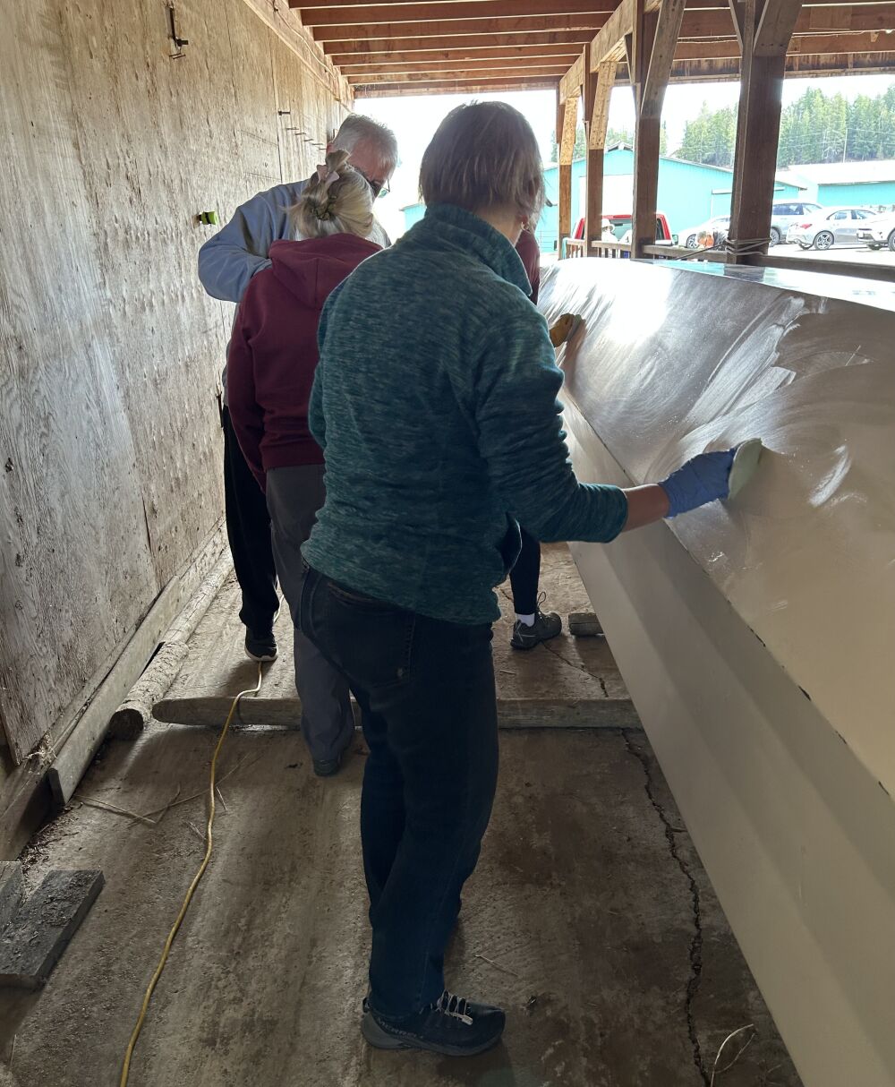 Dorothea applying wax